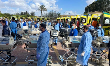 Egyptian medics stand by with incubators to receive premature Palestinian babies evacuated from Gaza on the Egyptian side of the Rafah border crossing. Photograph: AFP/Getty Images