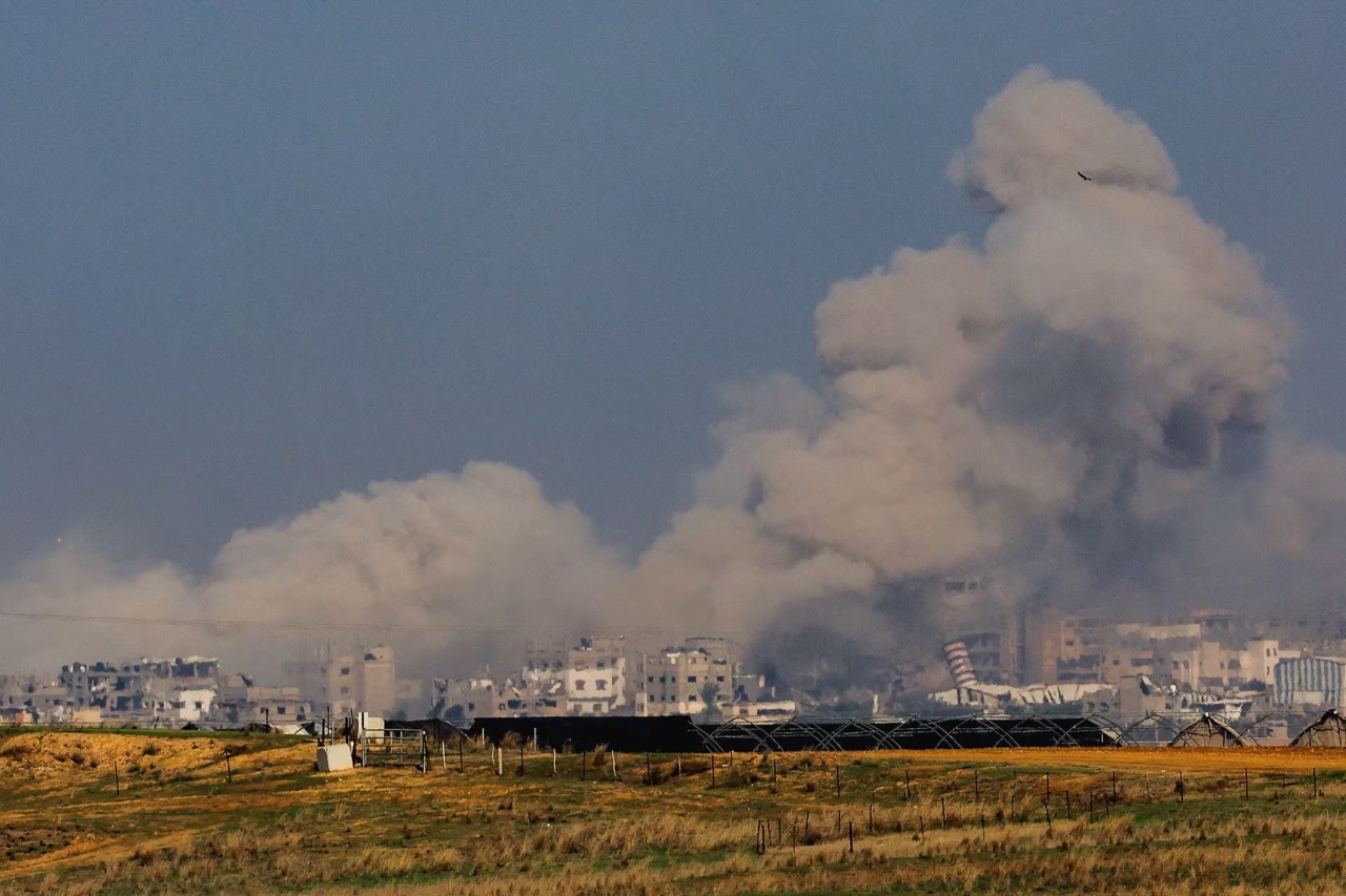 Smoke rises in Gaza, amid the ongoing conflict between Israel and the Palestinian Islamist group Hamas, as seen from southern Israel, December 6, 2023. [REUTERS/Athit Perawongmetha]