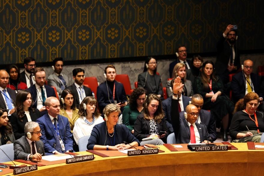 US deputy ambassador to the UN Robert Wood (2nd R) raises his hand during a United Nations Security Council vote about a ceasefire in Gaza at UN headquarters in New York on December 8,2023. [Charly Triballeuau/AFP]